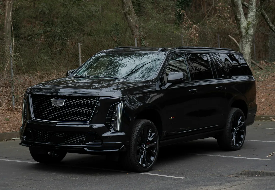Black Cadillac Escalade luxury SUV